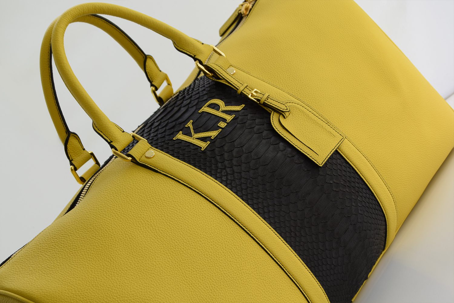 yellow leather-duffle-bag