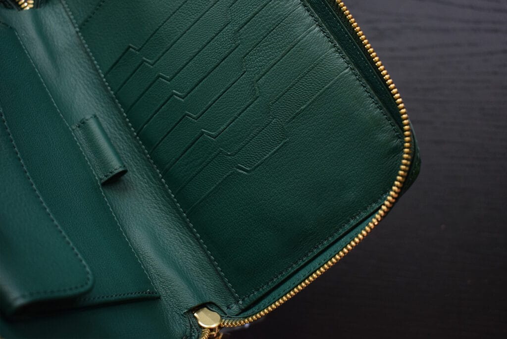 green crocodile pouch interior