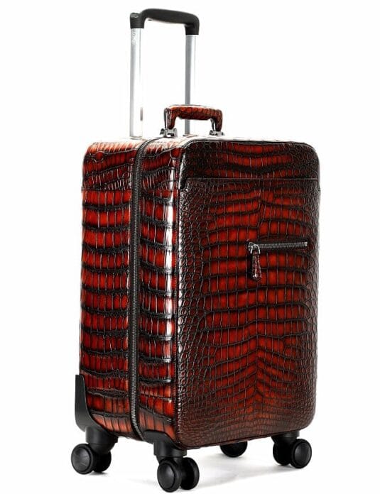 red patina crocodile suitcase